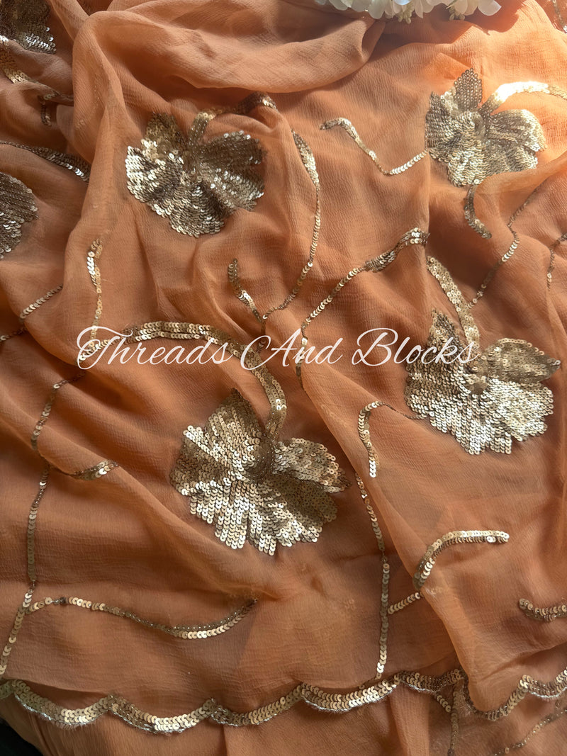 Rusty Peach Sequin Floral Border Saree – Threads & Blocks