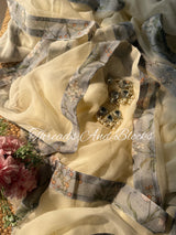 Vanilla Cream Printed Border Saree