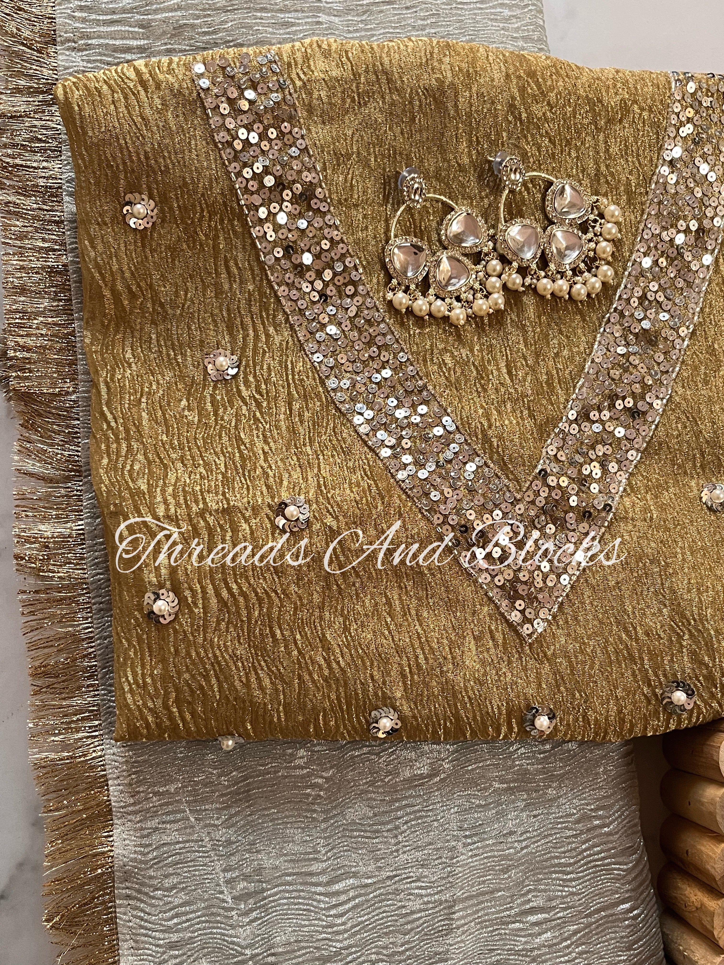 Silver Tissue Saree with Gold Blouse