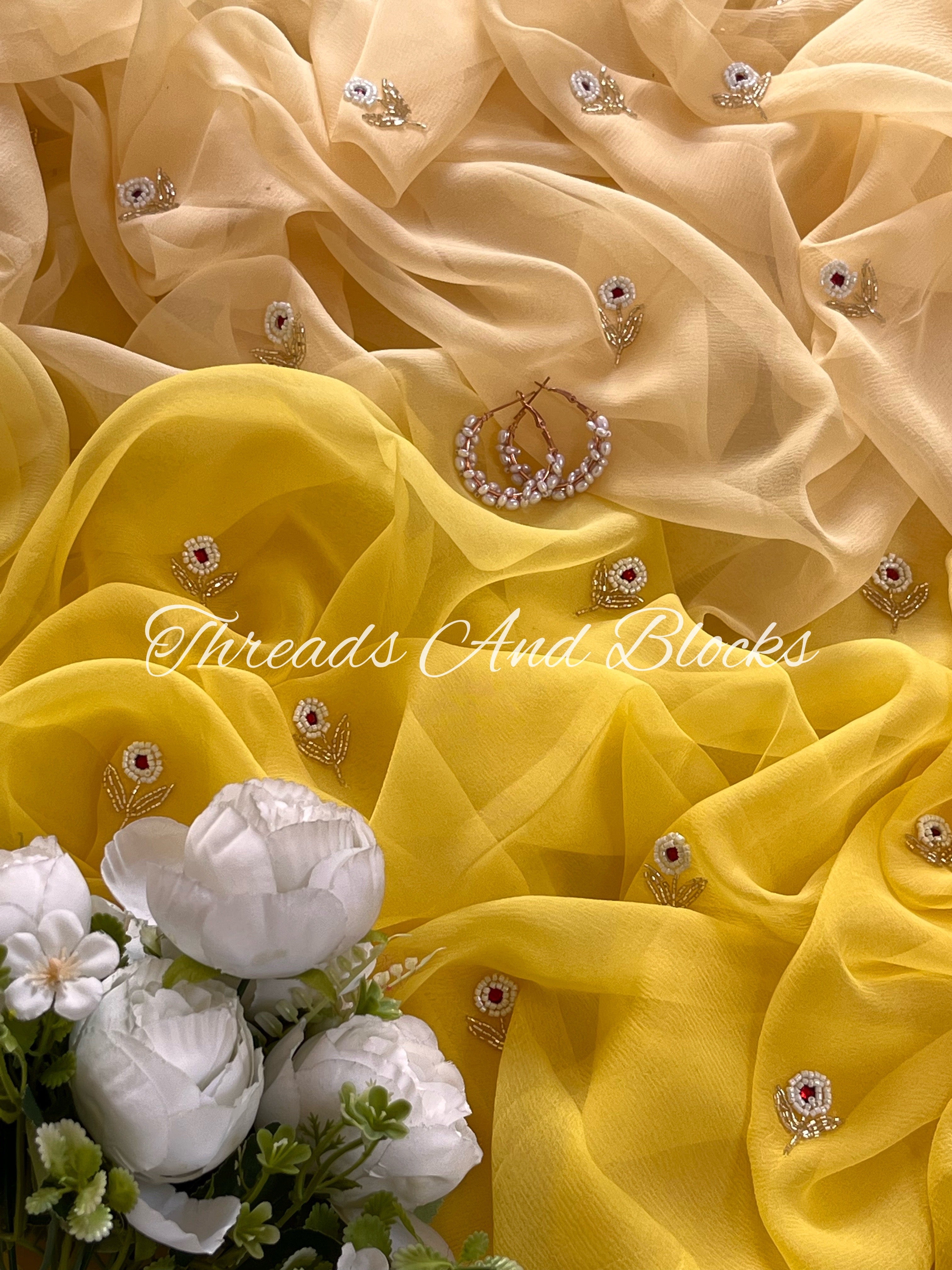 Beige Yellow Pearl Buti Saree