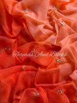 Hues of Orange Mukaish Floral Saree