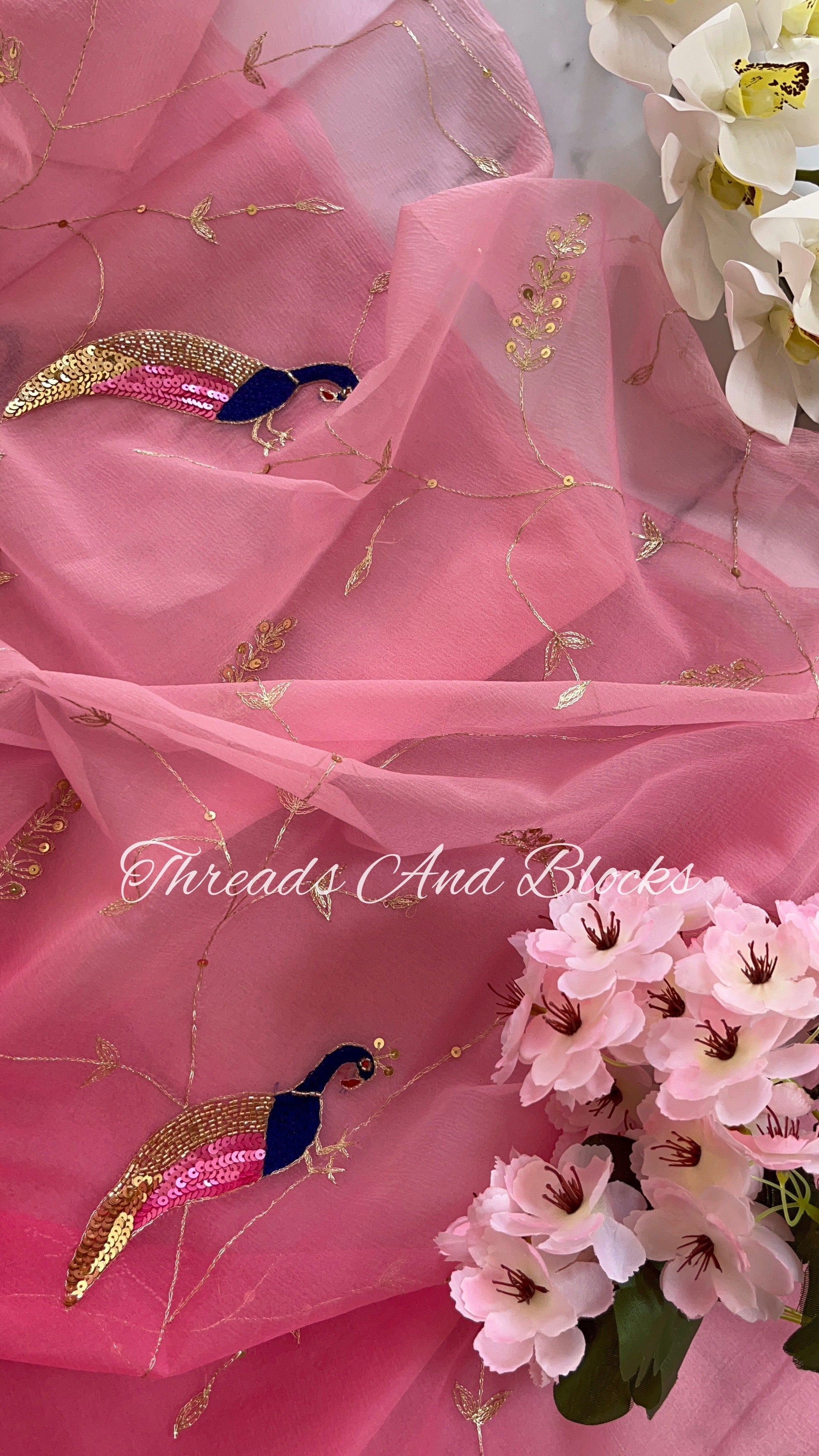 Shaded Pink Jaal Saree with Peacocks